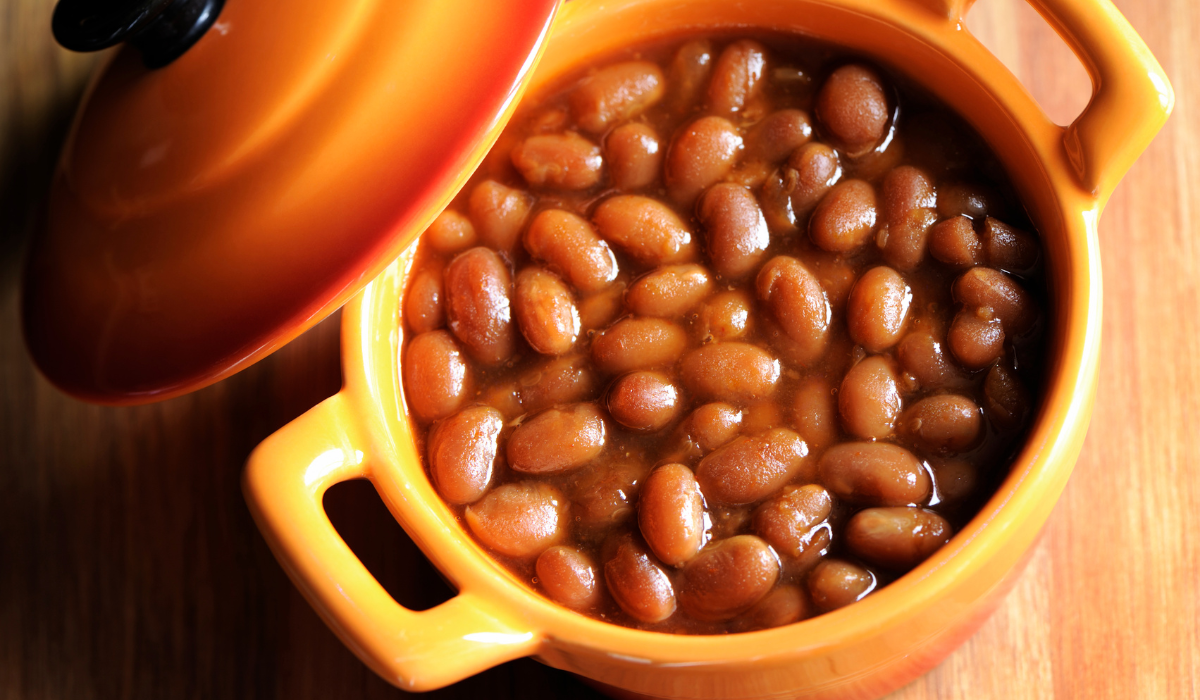 A delicious and hearty dish known as Grandma Brown's Baked Beans, made with beans, tomato sauce, and various seasonings, creating a comforting and savory meal