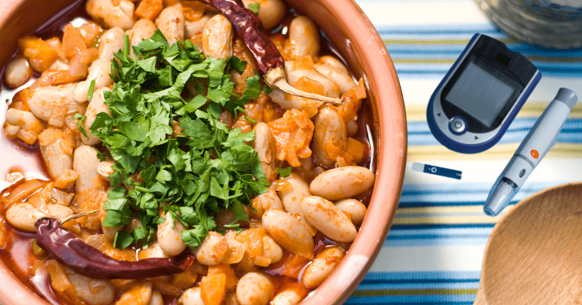 A bowl of flavorful beans seasoned with aromatic herbs and spices.