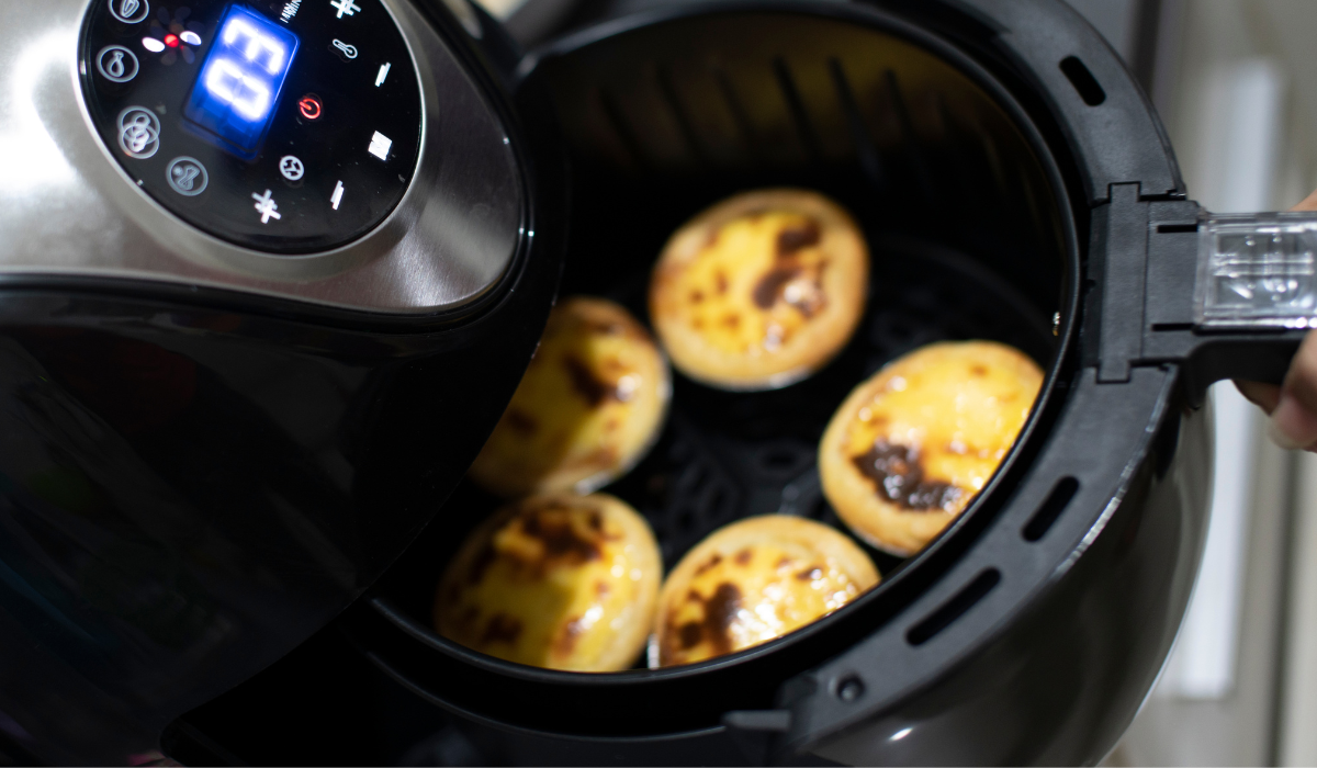 A person holding air fryer pancakes, ready to be enjoyed.